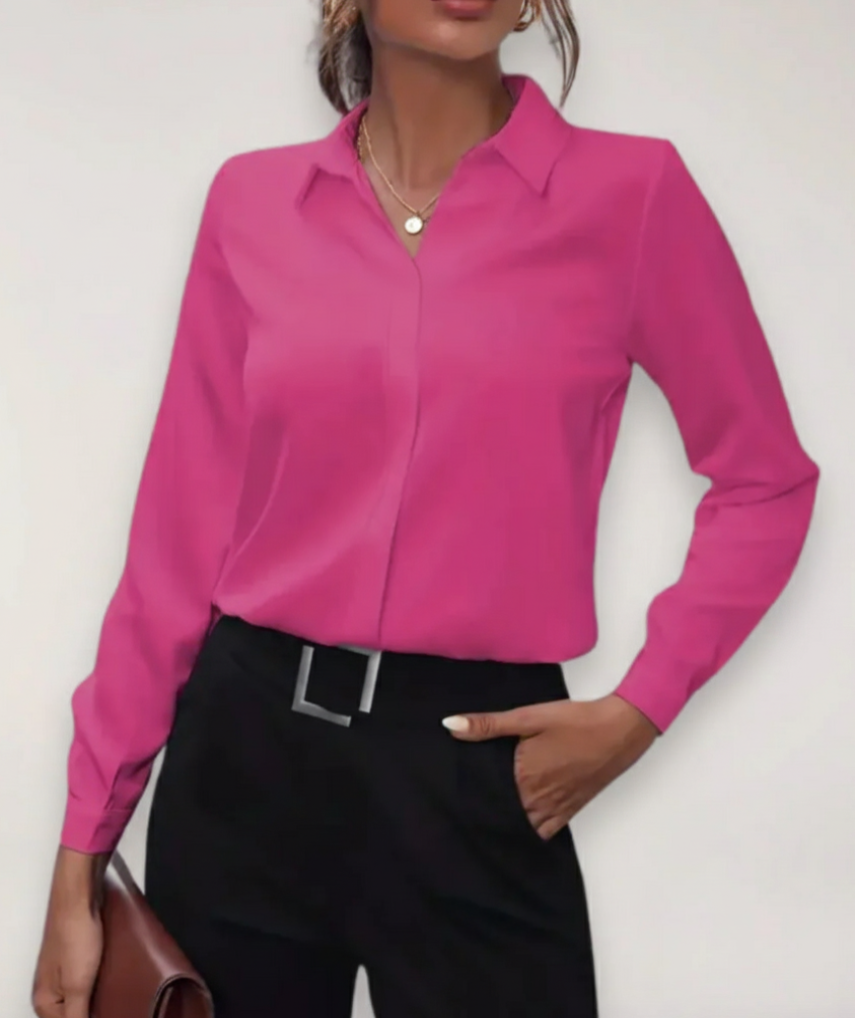 Women's tailored blouse with button placket, ideal for office wear.