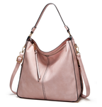Sac à main en cuir rose élégant avec bandoulière réglable, design moderne, idéal pour femme, accessoire de mode tendance, style chic et pratique.