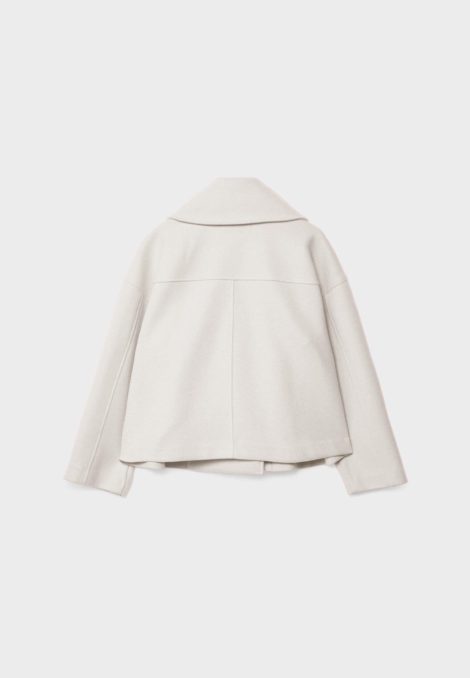 Manteau court pour femme avec double rangée de boutons et design intemporel