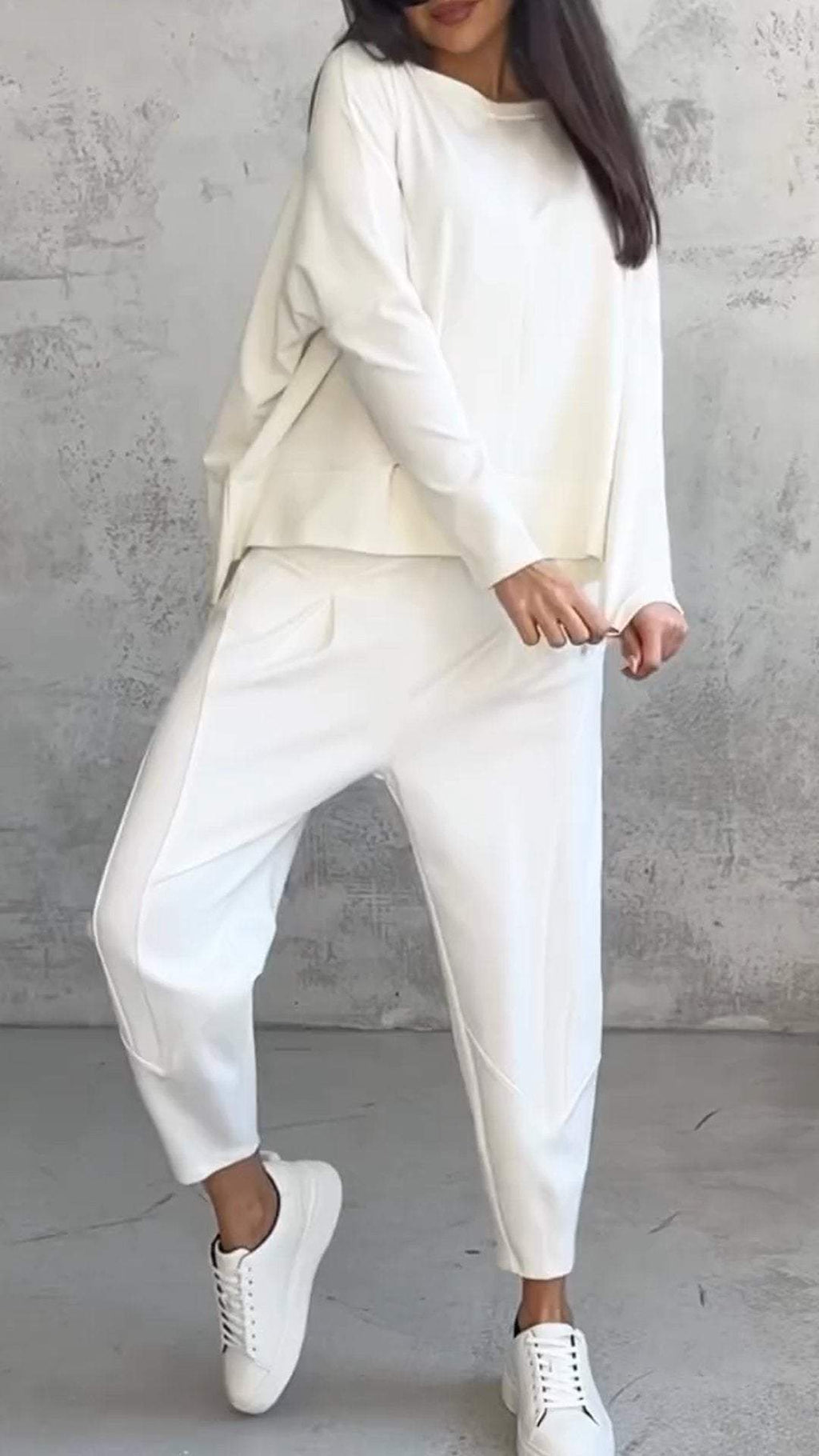 Women's casual summer set with oversized sweater and tapered pants
