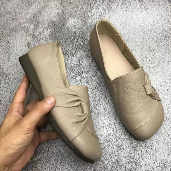 Chaussures plates en cuir beige pour femmes, design élégant avec nœud décoratif, semelle antidérapante, confortables et tendance.