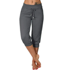 Pantalon capri gris pour femme, taille élastique avec cordon, poches latérales, style décontracté, idéal pour le sport et les loisirs.