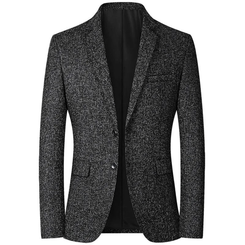 Blazer homme élégant en tweed gris foncé, coupe ajustée, deux boutons, poches à rabat, idéal pour tenues formelles et professionnelles.