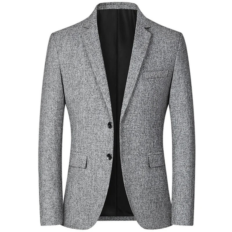 Veste homme élégante en tweed gris, coupe ajustée, deux boutons, poches à rabat, idéale pour tenues formelles et professionnelles.