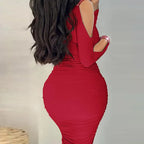 Robe mi-longue moulante épaule dénudée col V strass