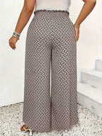Pantalon taille haute ample fendu