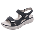 Sandale noire en cuir pour femme avec semelle épaisse antidérapante, fermeture velcro, design confortable et moderne, idéale pour l'été.