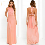 Robe longue rose pêche élégante, dos croisé, sans manches, style soirée, femme, mode chic, tendance, tissu fluide, design moderne.
