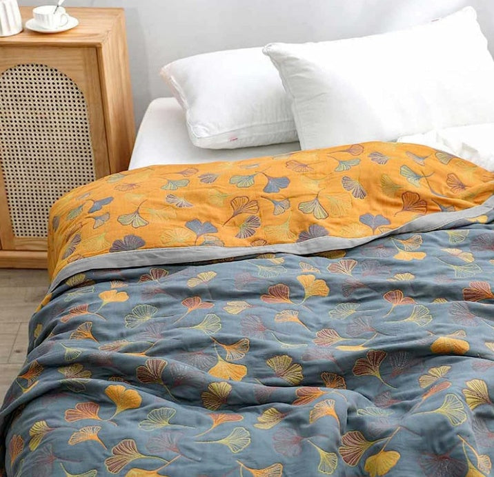 Reversible cotton blanket with floral patterns