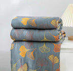 Reversible cotton blanket with floral patterns