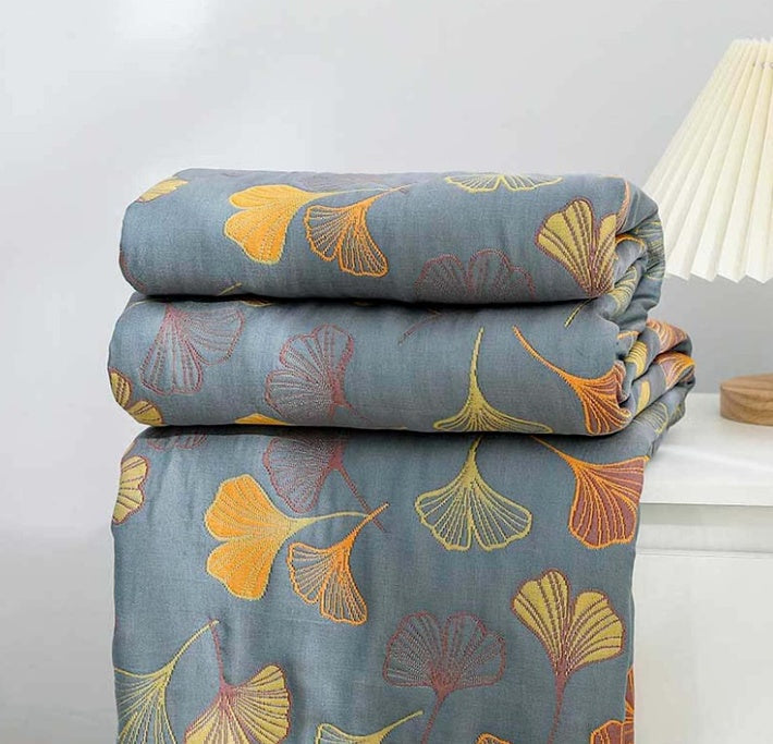 Reversible cotton blanket with floral patterns