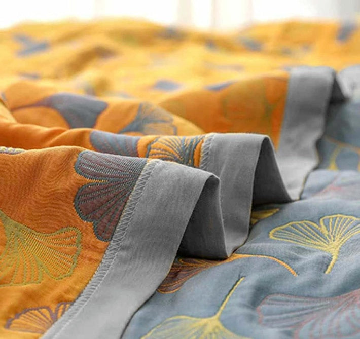 Reversible cotton blanket with floral patterns