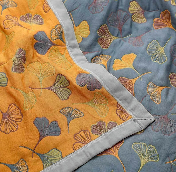 Reversible cotton blanket with floral patterns