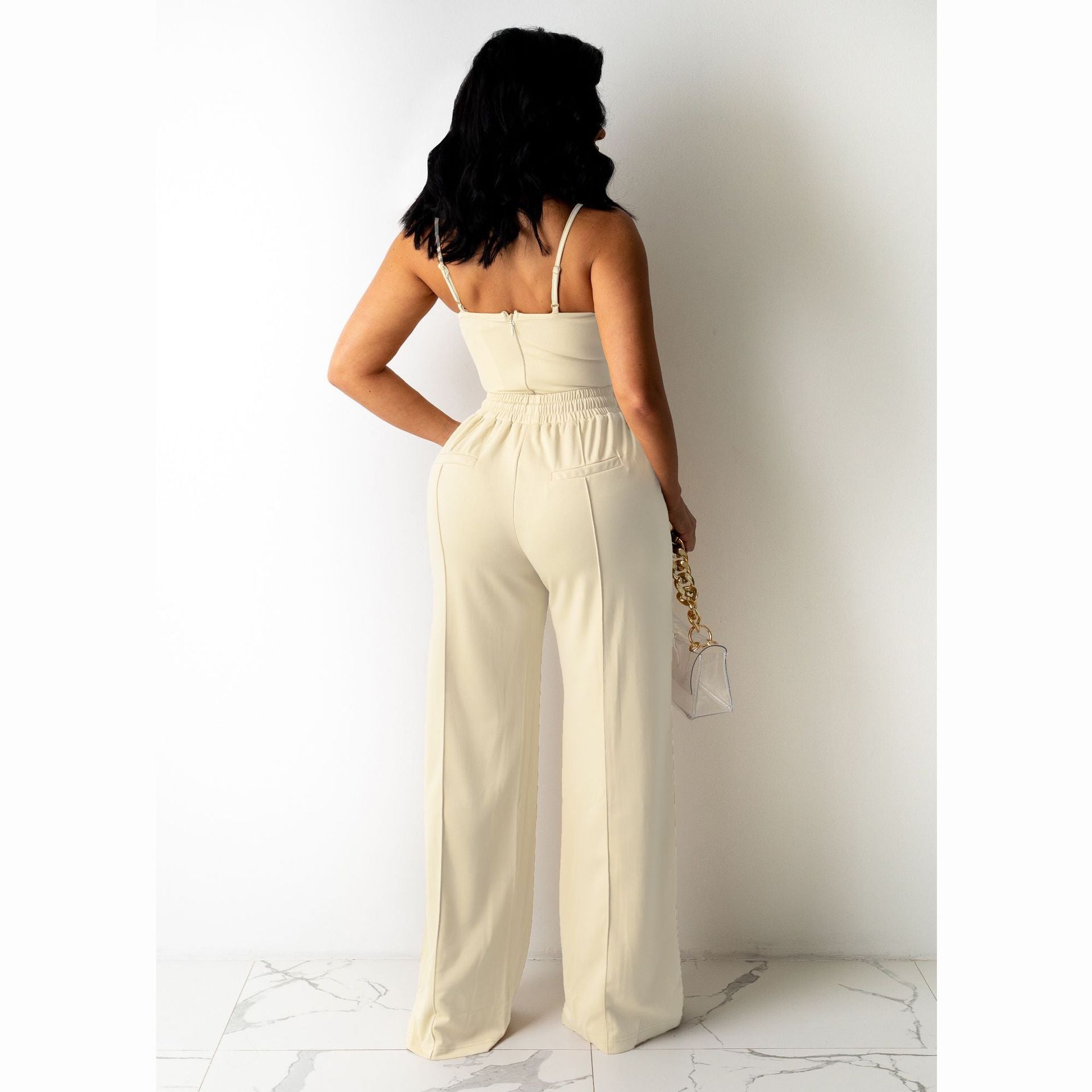 Ensemble haut à bretelle sans manches et pantalon large unie