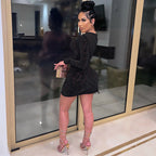 Mini robe moulante manches longues à fermeture éclair découpe asymétrique sexy