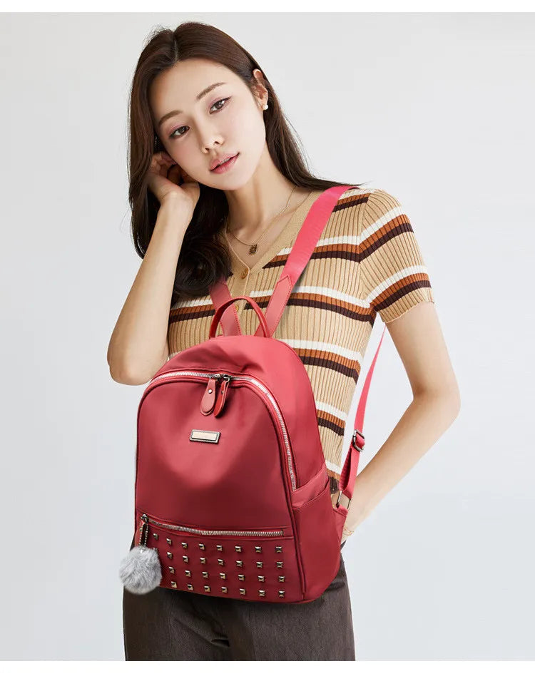 Sac à dos en cuir ciré souple à rivets