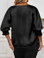 Chemise à manches longues en satin à col en V