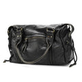 Sac à main en cuir noir élégant avec poches zippées, anses robustes et détails tressés. Accessoire mode femme chic et pratique.