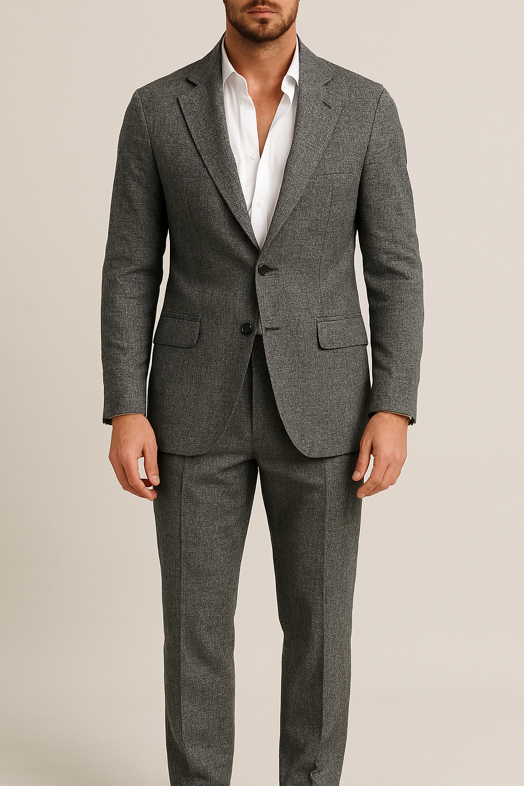 Costume homme gris élégant, veste ajustée, chemise blanche, style formel, mode masculine, tenue professionnelle, prêt-à-porter, tendance actuelle.