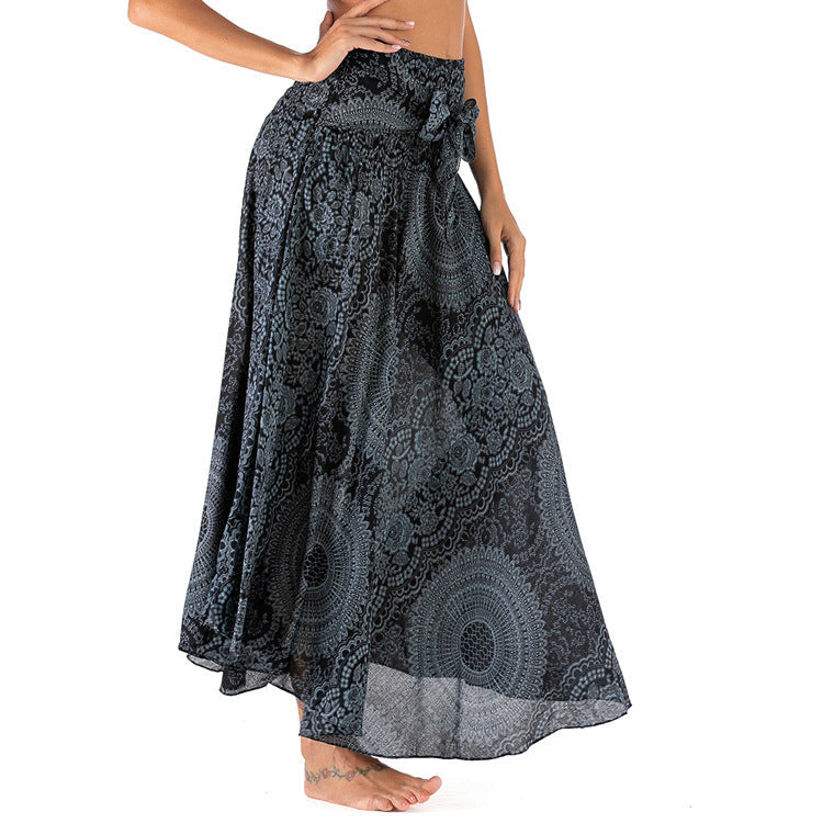 Jupe longue bohème noire à motifs mandala, taille haute, nouée à la ceinture, style décontracté, idéale pour l'été et les festivals.
