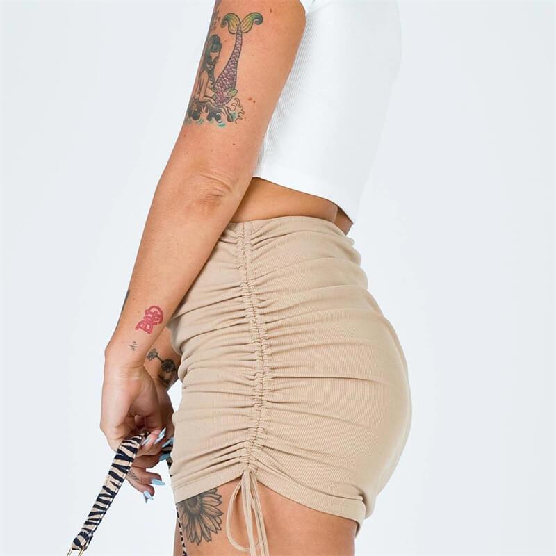 Jupe courte plissés sexy en tricot de nervures couleur unie