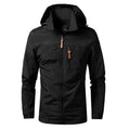 Veste imperméable noire avec capuche, fermeture éclair et poches zippées, idéale pour randonnée et activités extérieures. Style moderne et fonctionnel.