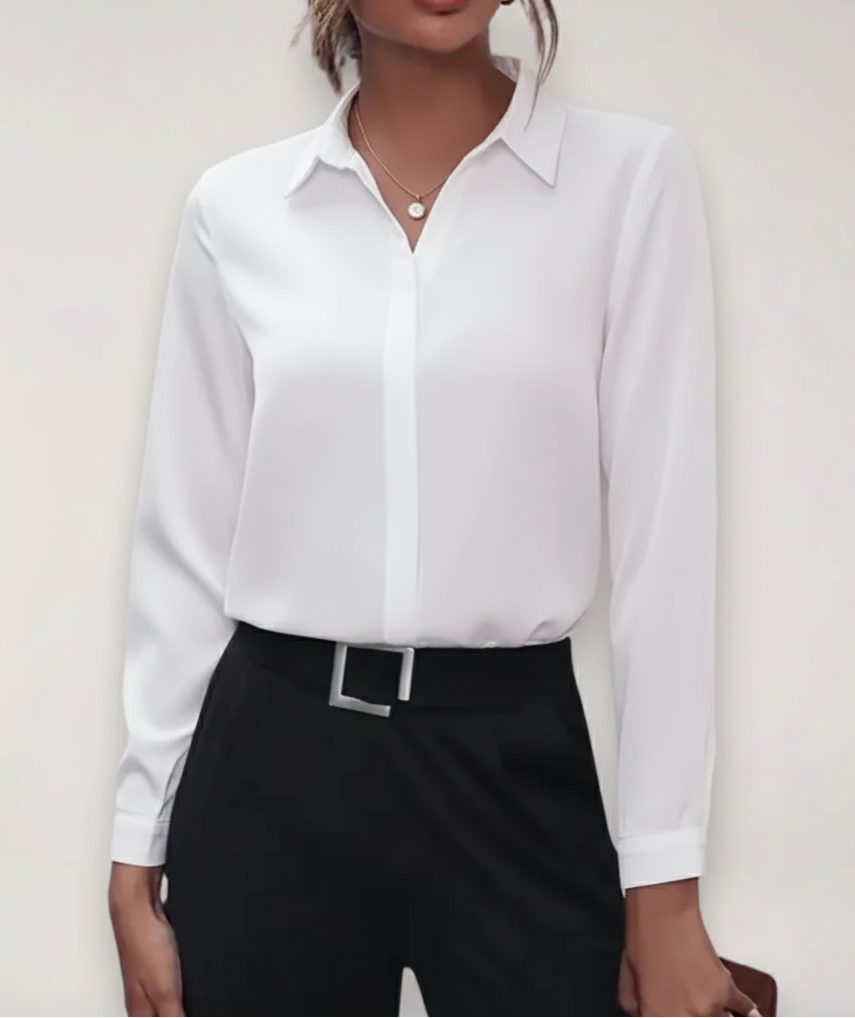 Women's tailored blouse with button placket, ideal for office wear.