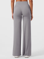 Pantalon évasé taille haute – Coupe droite stretch épousant les hanches
