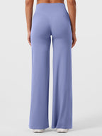 Pantalon évasé taille haute – Coupe droite stretch épousant les hanches