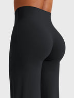 Pantalon évasé taille haute – Coupe droite stretch épousant les hanches