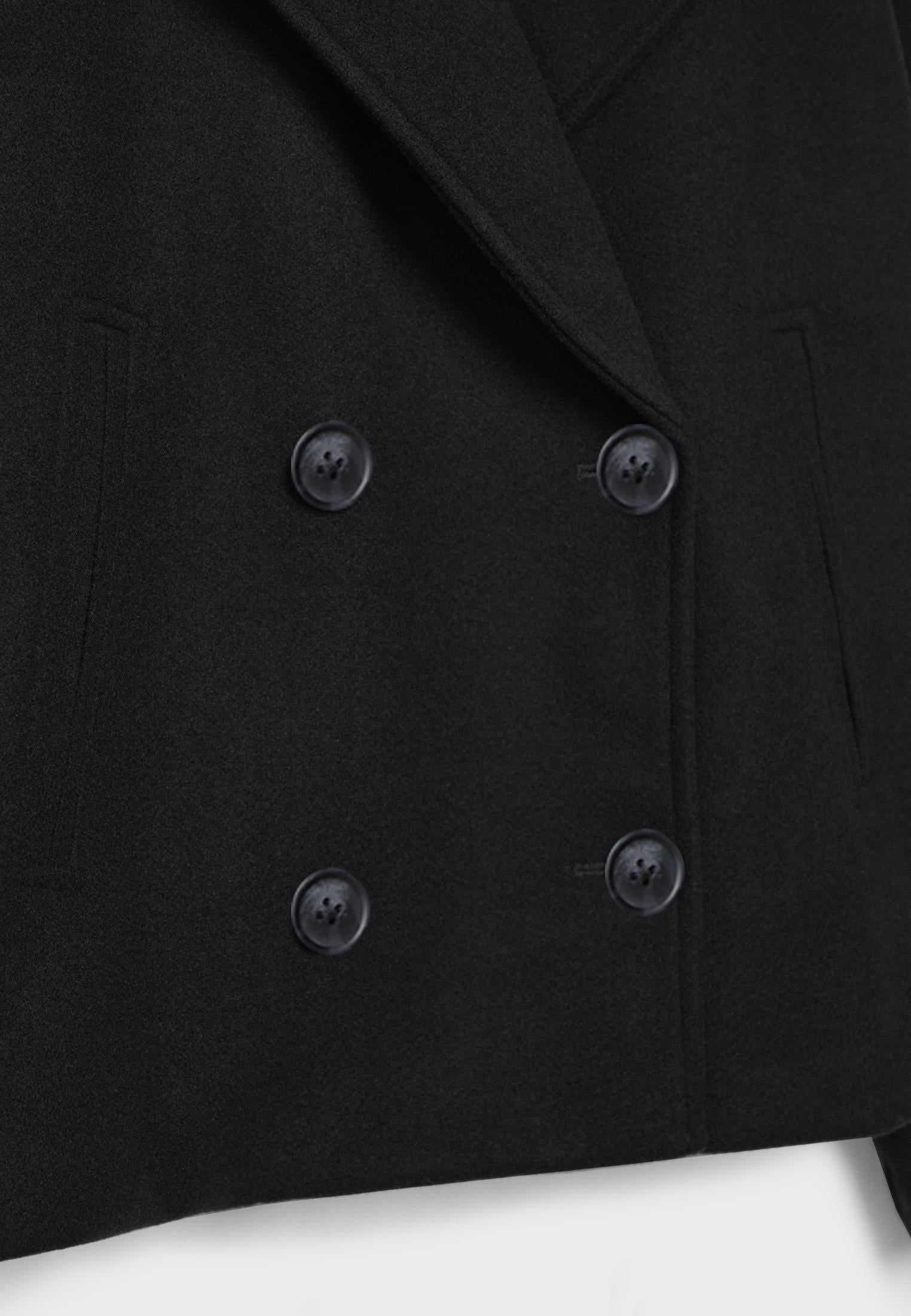 Manteau court pour femme avec double rangée de boutons et design intemporel